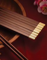 baguette-chinoise-en-bois-doree