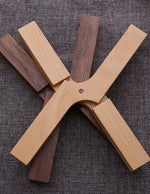 dessous-de-plat-pliable-en-bois-massif