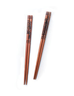 paire-de-baguette-chinoise-grave-avec-un-dragon